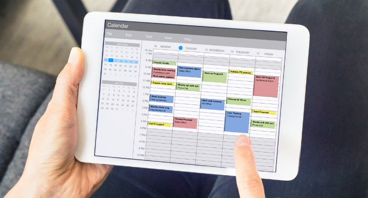 Tablet showing an email calendar. It represents the concept of keeping yourself organised and be aware of timelines